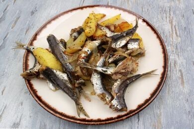 Baked sardines with potatoes